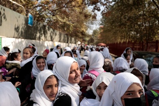 Female primary school students leave school in Kabul last October. 
The Taliban had banned girls from continuing secondary education and blamed lack of teachers for closing down of schools. (Photo: Reuters File)