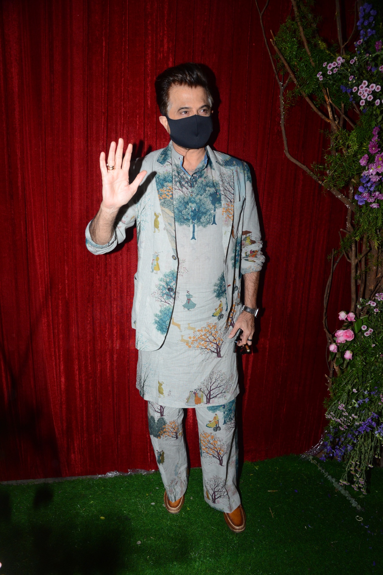 Superstar Anil Kapoor attended party in a blue attire but decided to keep his mask on. (Photo: Viral Bhayani)