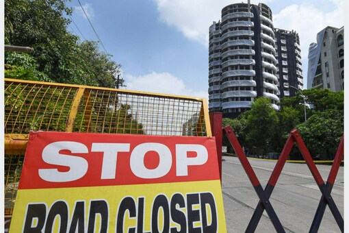 Noida: Barricades used to block a road leading to Supertech twin towers ahead of their demolition with explosives in compliance with a Supreme Court order, in Noida. (PTI photo)