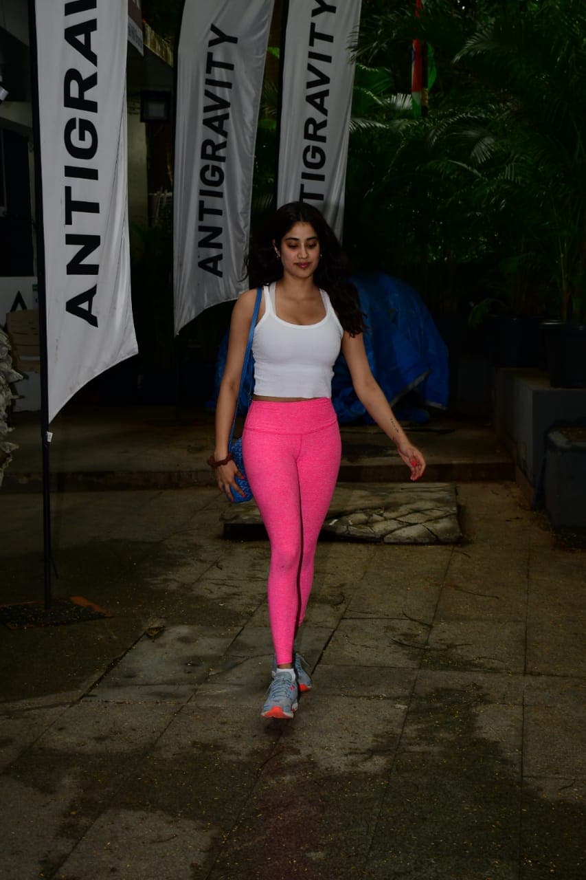 Janhvi Kapoor in hot pink sports bra and yoga pants is the gym