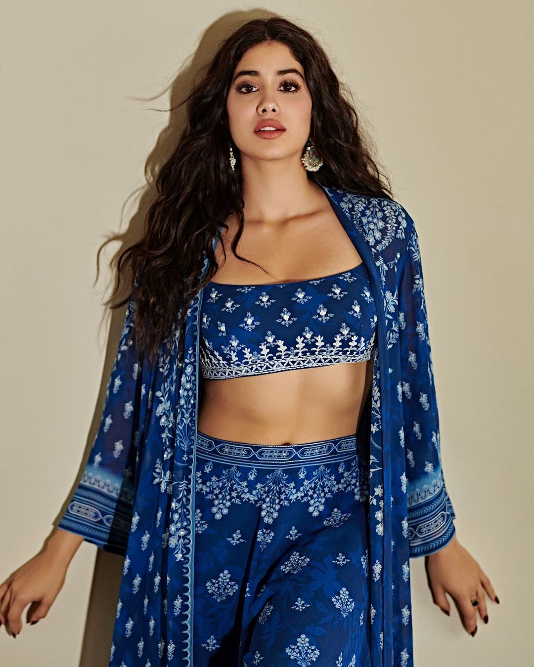 A crop top with palazzo pants and a shrug is the best way to break the dilemma and let your inner diva enjoy the flavours of both ethnic and western looks. (Image: Instagram/janhvikapoor)