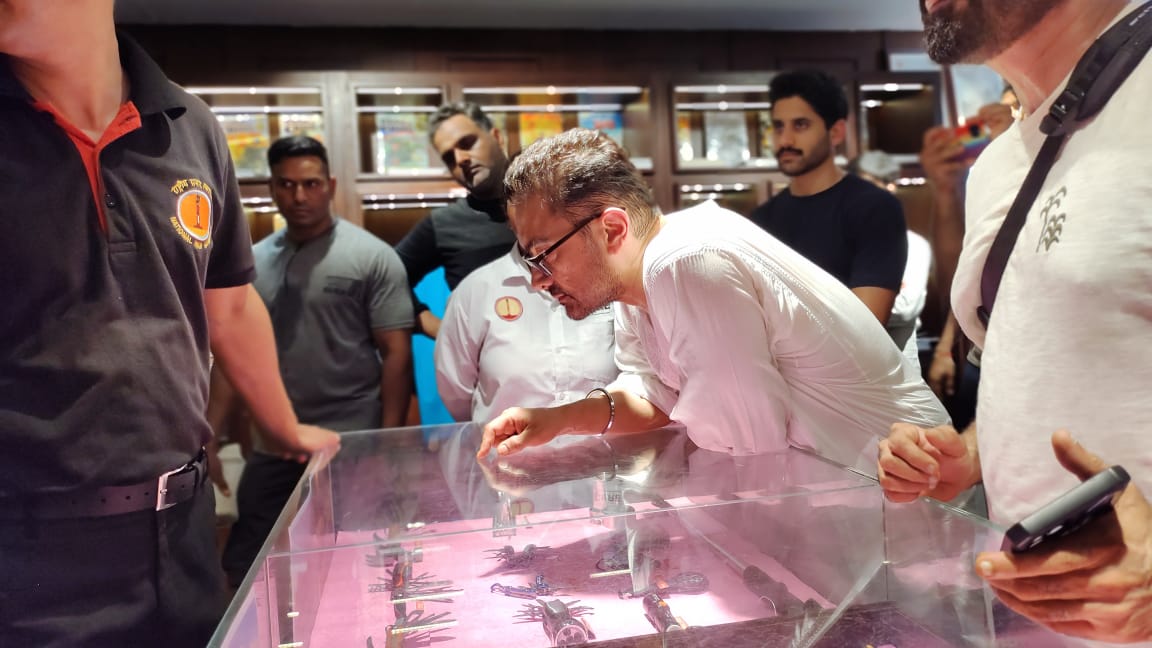 Aamir Khan interacts with officials at the war memorial in the national capital. 