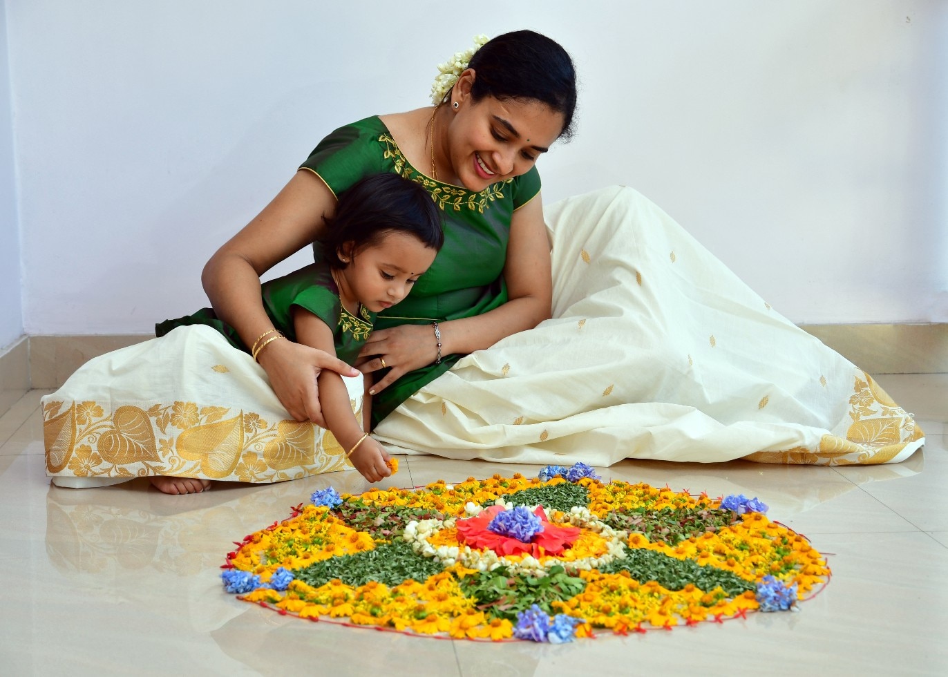 Onam 2022: Pookalam is the rangoli design or pattern that is made at the entrance of homes and temples on Onam. (Representative image: Shutterstock)