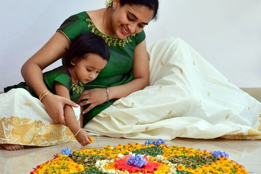 Onam 2022: Pookalam is the rangoli design or pattern that is made at the entrance of homes and temples on Onam. (Representative image: Shutterstock)
