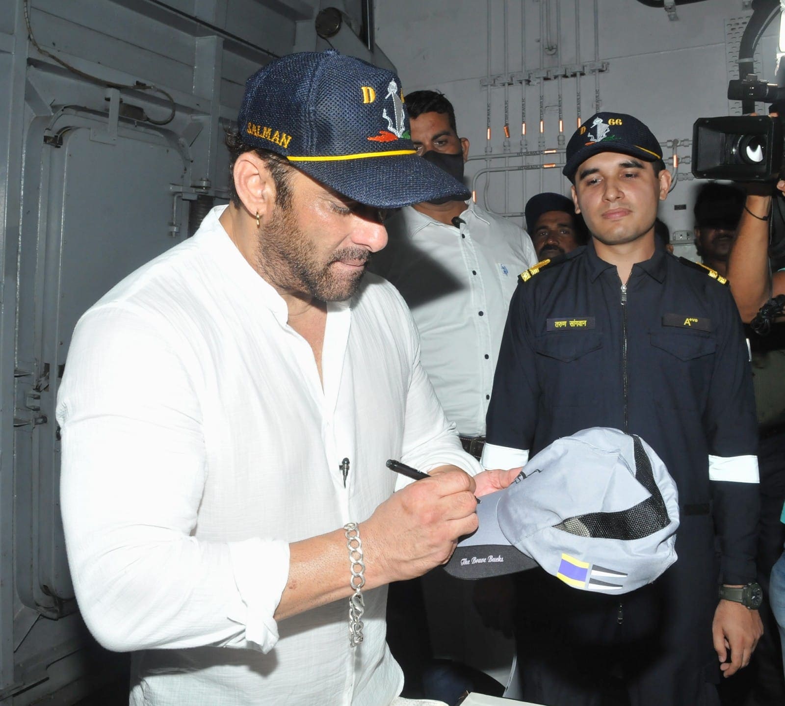 Salman Khan also signs autograph for Indian Navy sailors. 