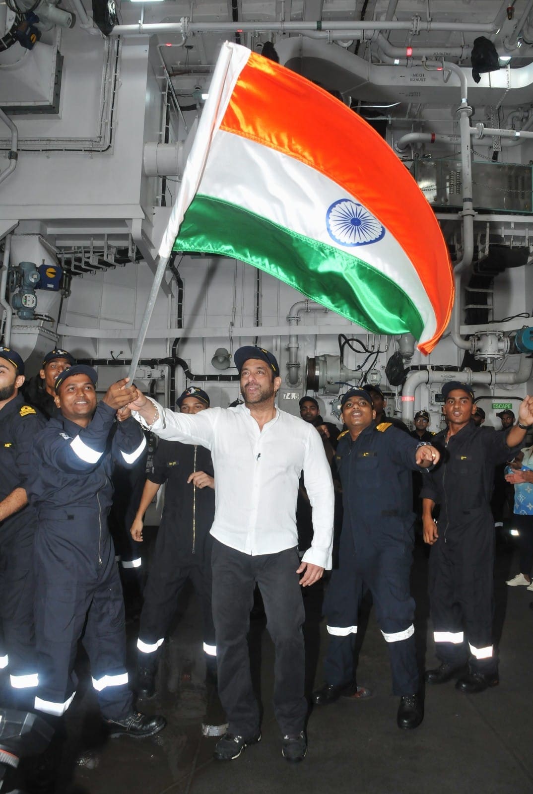 Salman Khan hoists tricolour as he spends a day with Indian Navy sailors. 