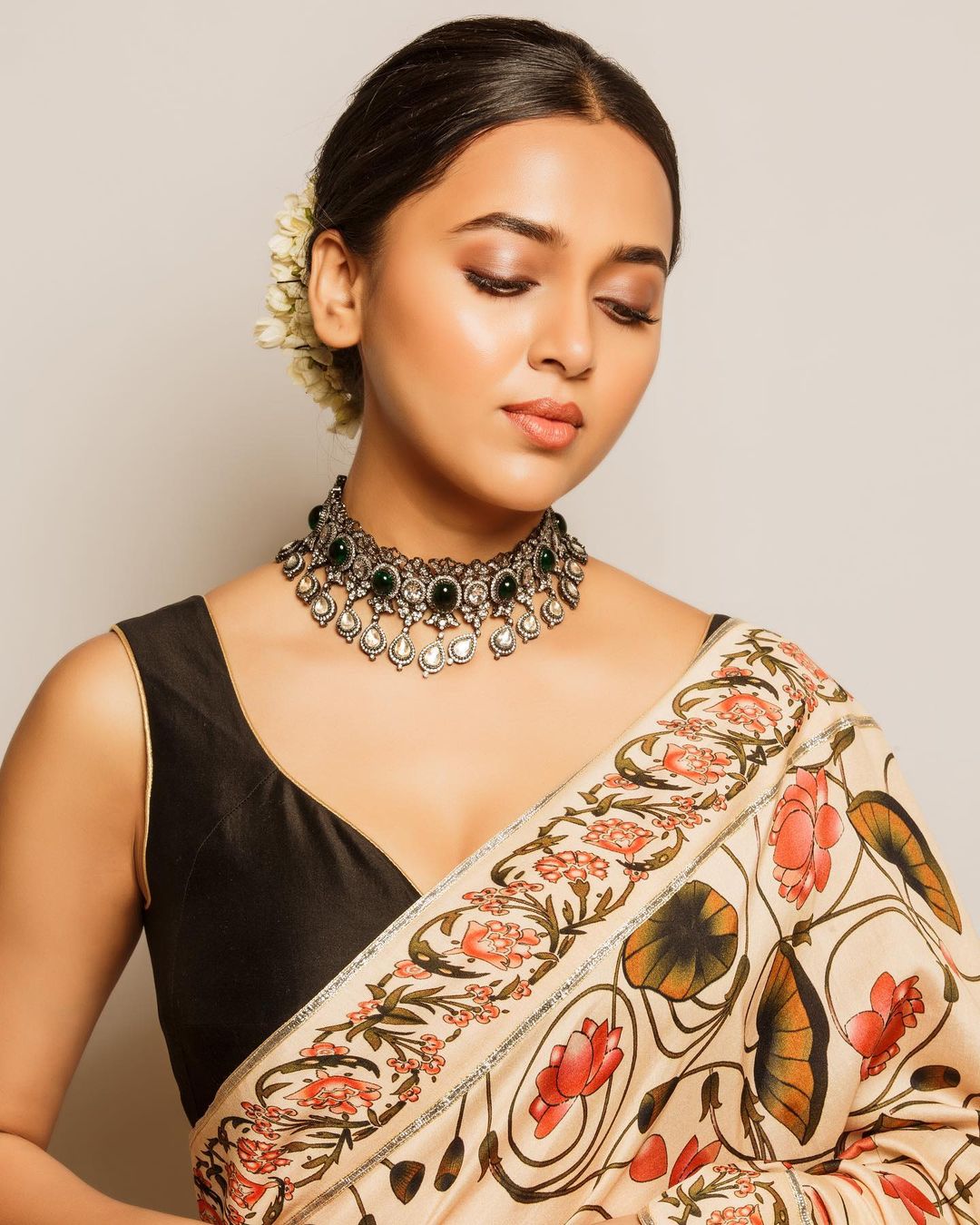 She wore a printed saree and accessorised the same with a black and silver choker (Photo: Instagram)  