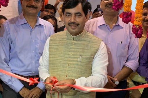 Bihar BJP leader Shahnawaz Hussain inaugurates a project in Delhi in capacity of the state industries minister, on Tuesday. (Image: @Syed Shahnawaz Hussain/Twitter)