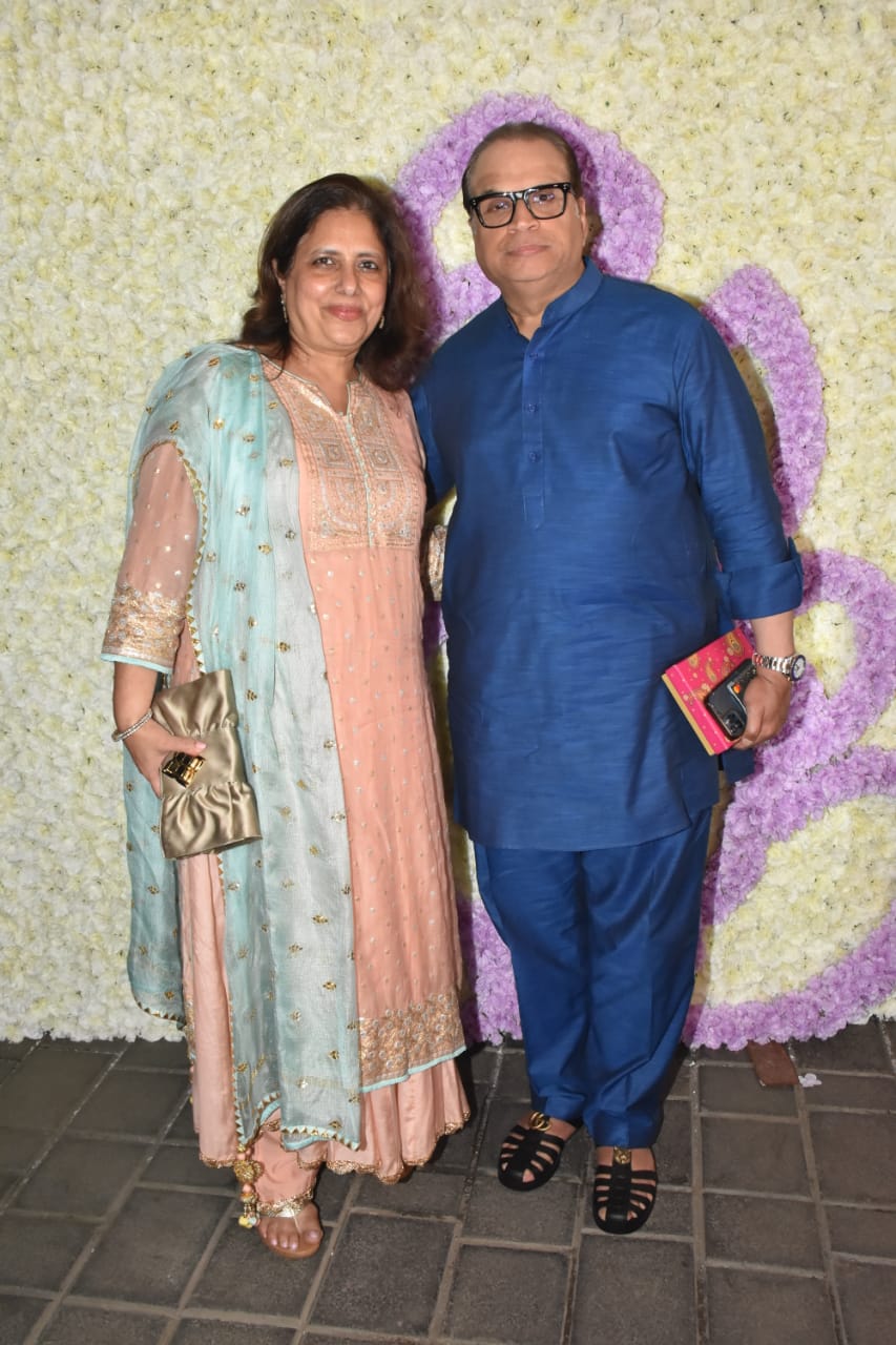 Filmmaker Ramesh Daurani with his wife at Aprita's residence for Ganesh Chaturthi celebrations. (Image: Viral Bhayani)