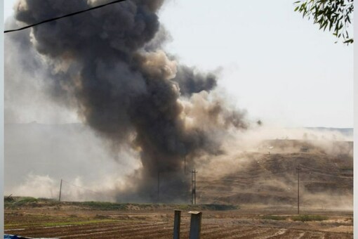 Smoke rises from the Iraqi Kurdistan headquarters of the Kurdish Democratic Party of Iran, after Iran's Revolutionary Guards' strike on the outskirts of Kirkuk, Iraq September 28, 2022. (Reuters photo)