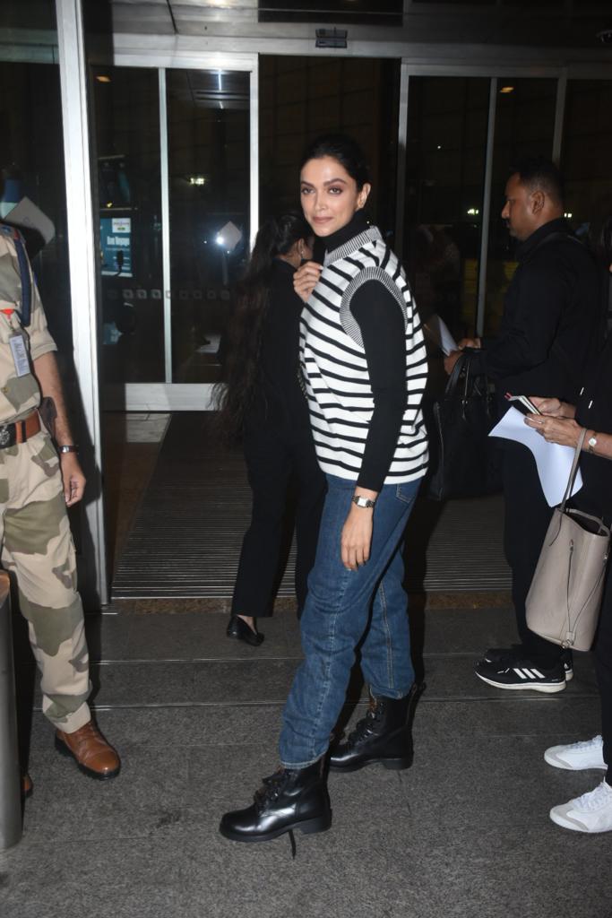 Deepika Padukone smiles for paparazzi at the airport. (Photo: Viral Bhayani) 