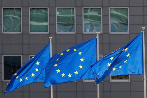 FILE PHOTO: European Union flags flutter outside the EU Commission headquarters in Brussels, Belgium June 17, 2022. REUTERS/Yves Herman