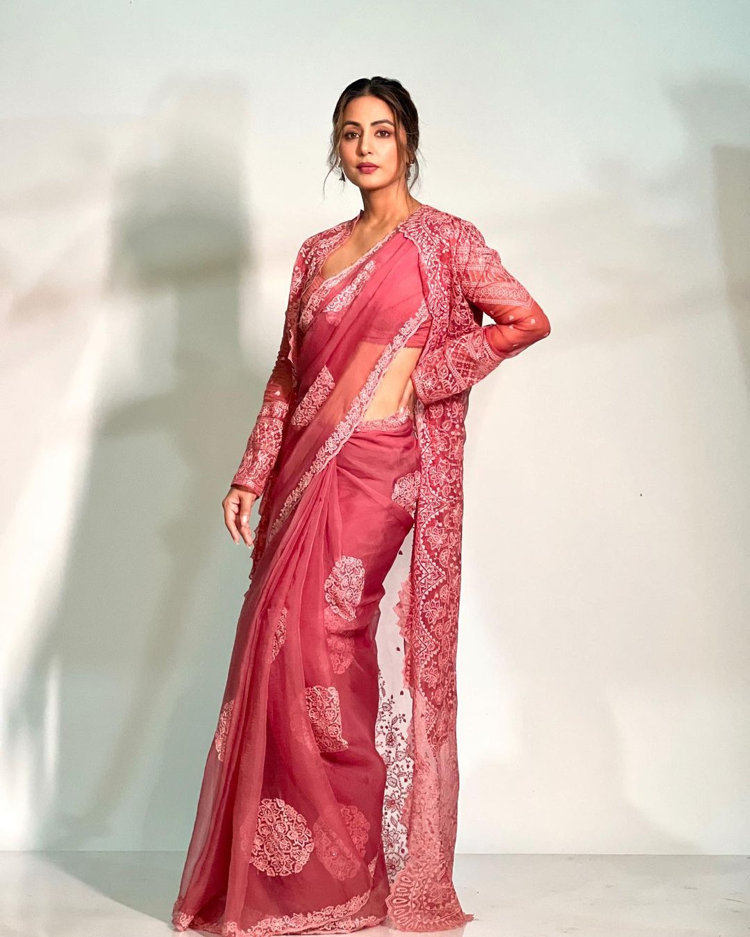 Hina Khan gives saree goals in an organza saree with a matching jacket.