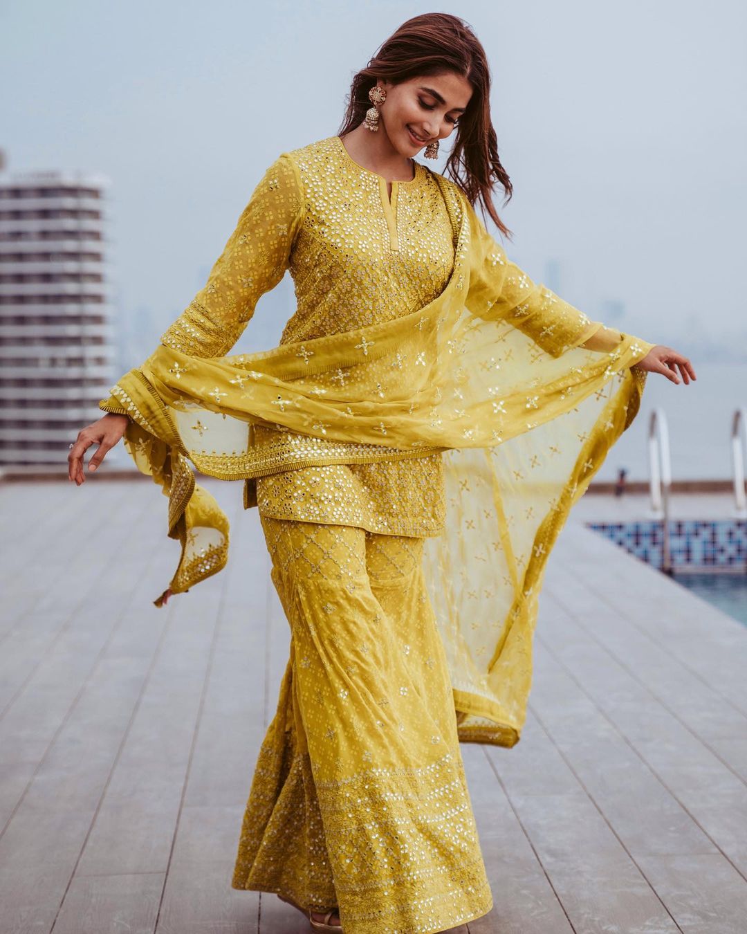 Pooja Hegde looks drop-dead gorgeous in a yellow sharara set. 
