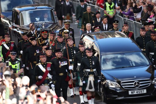 Britain's King Charles, Princesss Anne, Prince Andrew and Prince Edward follow the hearse carrying the coffin of Britain's Queen Elizabeth, in Edinburgh, Scotland, Britain September 12, 2022. REUTERS/Carl Recine

