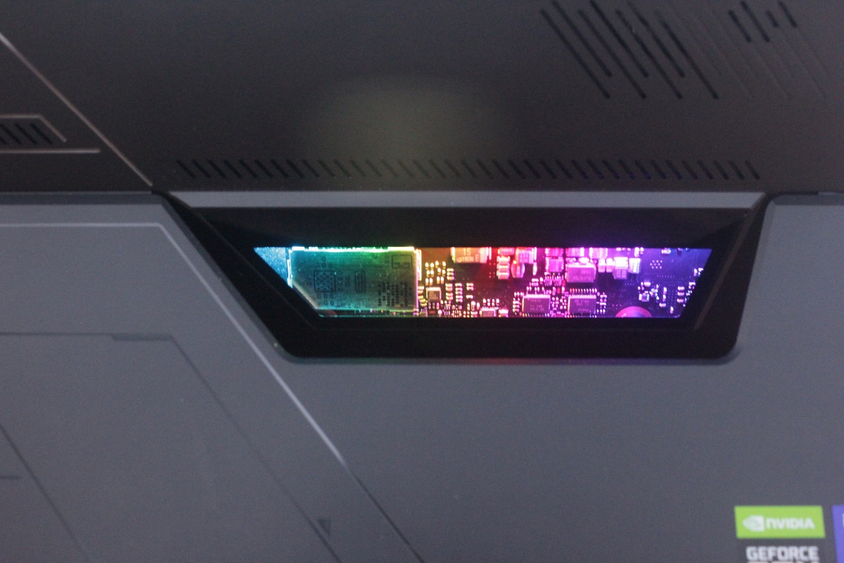 This transparent panel on the Asus ROG Flow Z13 keeps the motherboard exposed with RGB lights. (Image Credit: News18/ Darab Mansoor Ali)