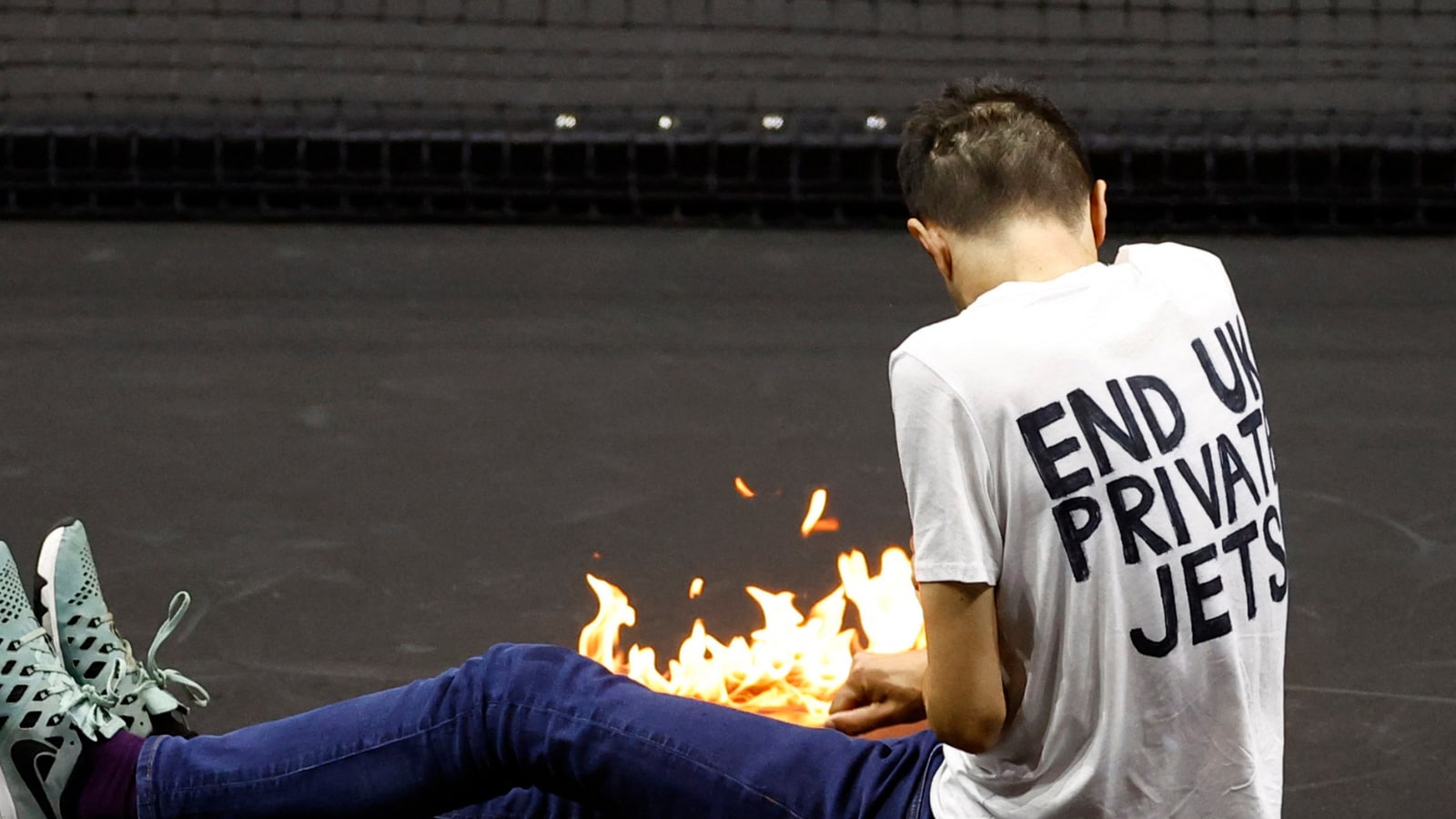 Laver Cup Match Briefly Halted after Protester Sets Arm on Fire on Court