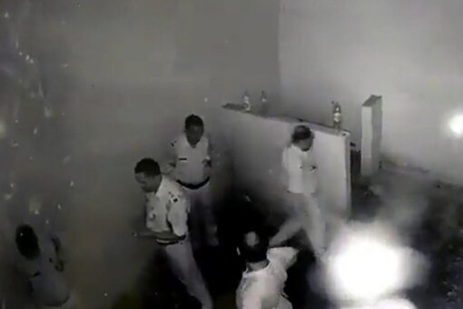 In the viral video five Bihar cops can be seen talking to each other inside the lockup (Image: Twitter AnilKumarVerma_)