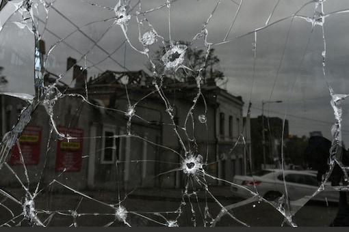 (Image for representation) A building damaged by a Russian missile strike is reflected in a window broken with shrapnel in central Dnipro, Ukraine. (REUTERS/Mykola Synelnykov)