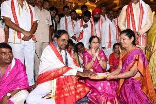 On behalf of KCR's family, his grandson Himanshu presented silk clothes to the Lord (Image: News18) 