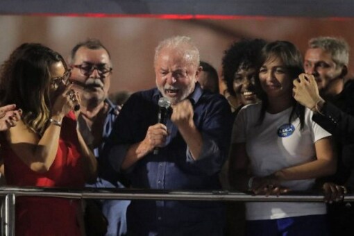 Brazilian president-elect for the leftist Workers Party (PT) Luiz Inacio Lula da Silva delivers a speech to supporters at the Paulista avenue after winning the presidential run-off election. (AFP)