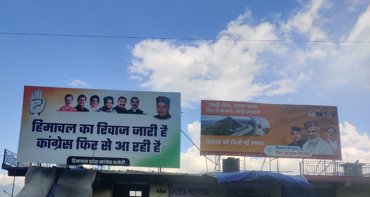 Hoardings of BJP and Congress on a road towards Shimla in Himachal Pradesh. (Photo: Pragya Kaushika/ News18) 