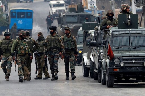 Soldiers leave a gun battle site after a suspected militant commander was killed, at Rangreth on the outskirts of Srinagar on November 1, 2020. (Image: REUTERS/Danish Ismail/File)