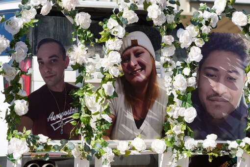 Photos of victims of a weekend mass shooting at a nearby gay nightclub are on display at a memorial in Colorado Springs, Colorado (Image: AP)