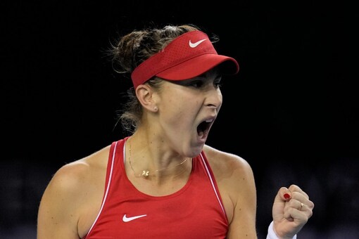 Switzerland's Belinda Bencic reacts after winning a point against Canada's Leylah Fernandez on the 4th day of the Billie Jean King Cup tennis finals at the Emirates Arena in Glasgow, Scotland Friday, Nov. 11, 2022. (AP Photo/Kin Cheung)