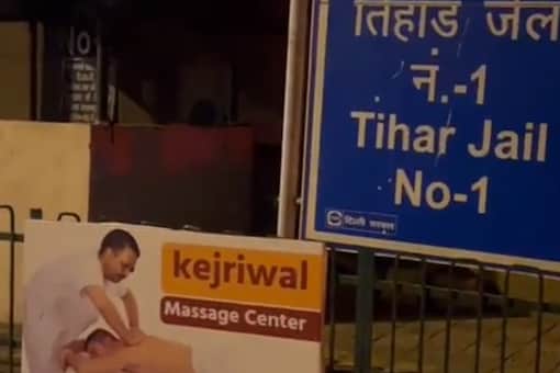 Delhi BJP leaders, including Amit Malviya, on Wednesday tweeted images of the poster put up outside Tihar Jail. (Twitter/@amitmalviya)