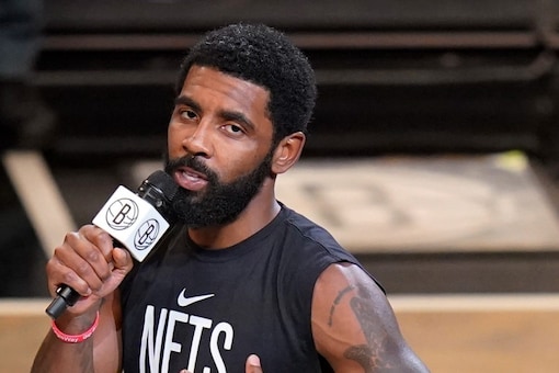 FILE - Brooklyn Nets' Kyrie Irving speaks before the team's NBA basketball game against the New Orleans Pelicans on Oct. 19, 2022, in New York. The Nets are suspending Irving for at least five games without pay, saying they were dismayed by his failure to “unequivocally say he has no antisemitic beliefs.” Hours after Irving refused to issue the apology that NBA Commissioner Adam Silver sought for posting a link to an antisemitic work on his Twitter feed, the Nets said that Irving is “currently unfit to be associated with the Brooklyn Nets.” (AP Photo/Frank Franklin II, File)