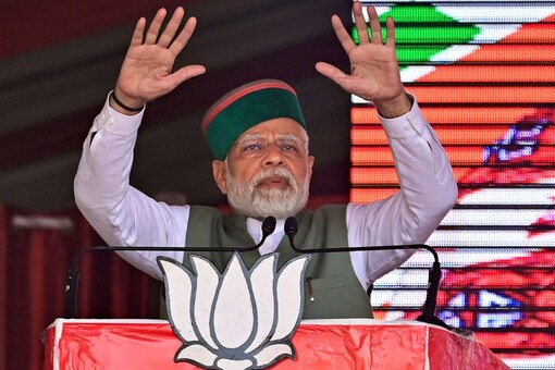 Prime Minister Narendra Modi addresses during a public meeting ahead of the Himachal Pradesh assembly elections at Sundar Nagar in Mandi district on Nov 5. (Image: PTI)