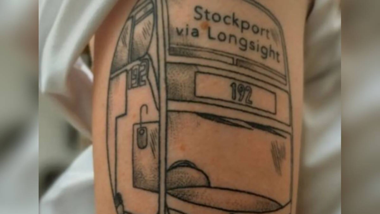 Stockport bus lover's family think tattoo is 'insane' - BBC News