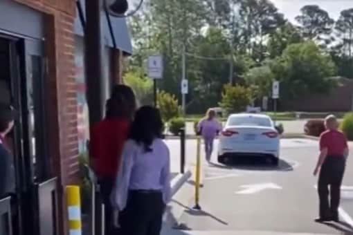 Woman's car rolls off street in viral video. (Credits: Twitter/@TansuYegen)