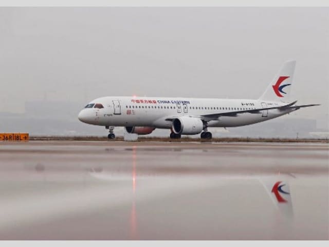 A Commercial Aircraft Corp of China (COMAC) C919 aircraft, China's first domestically produced large passenger jet, lands at Hongqiao International Airport after it is formally handed over to China Eastern Airlines in Shanghai. (AFP)