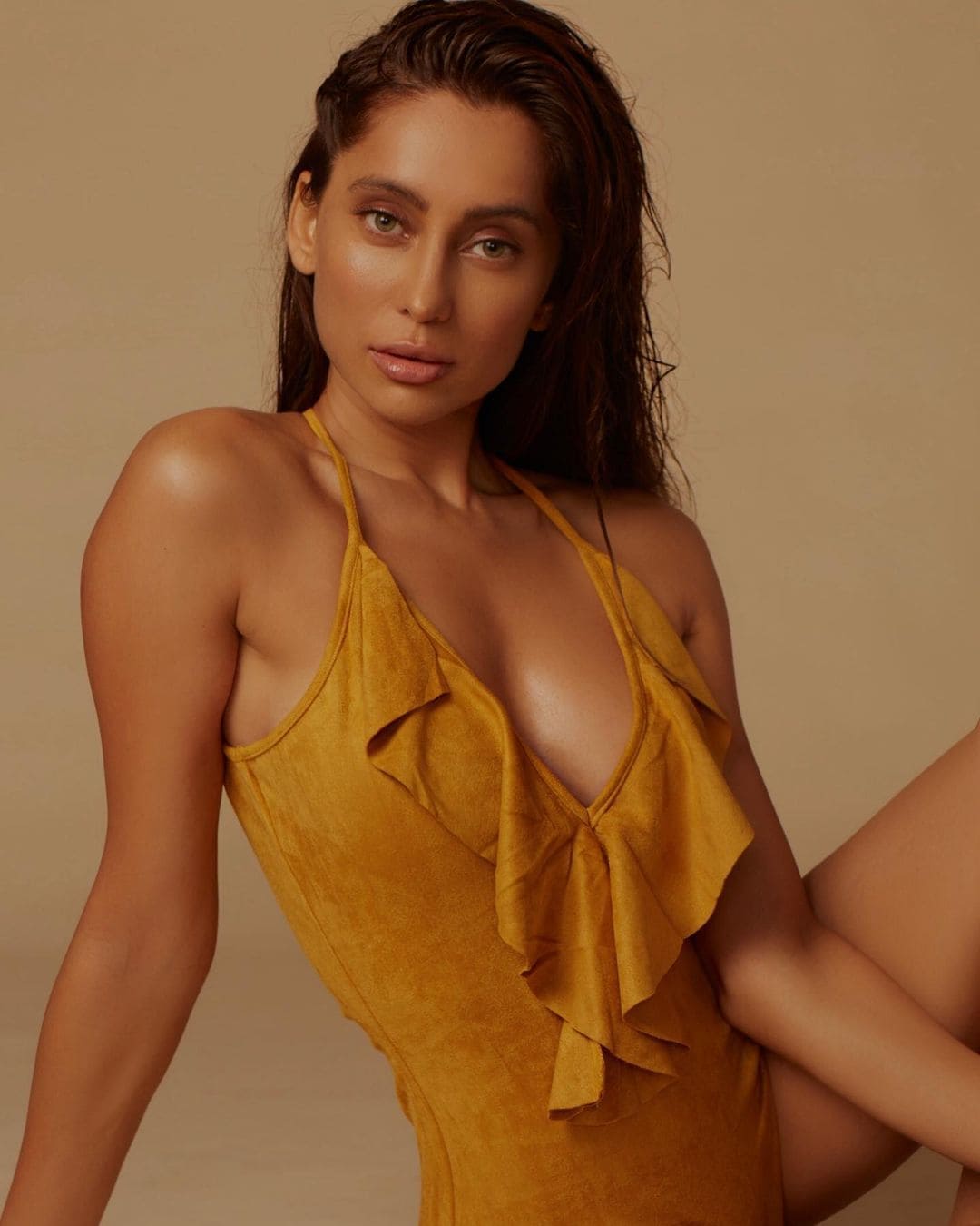 Anusha Dandekar looks sultry in a yellow monokini. 