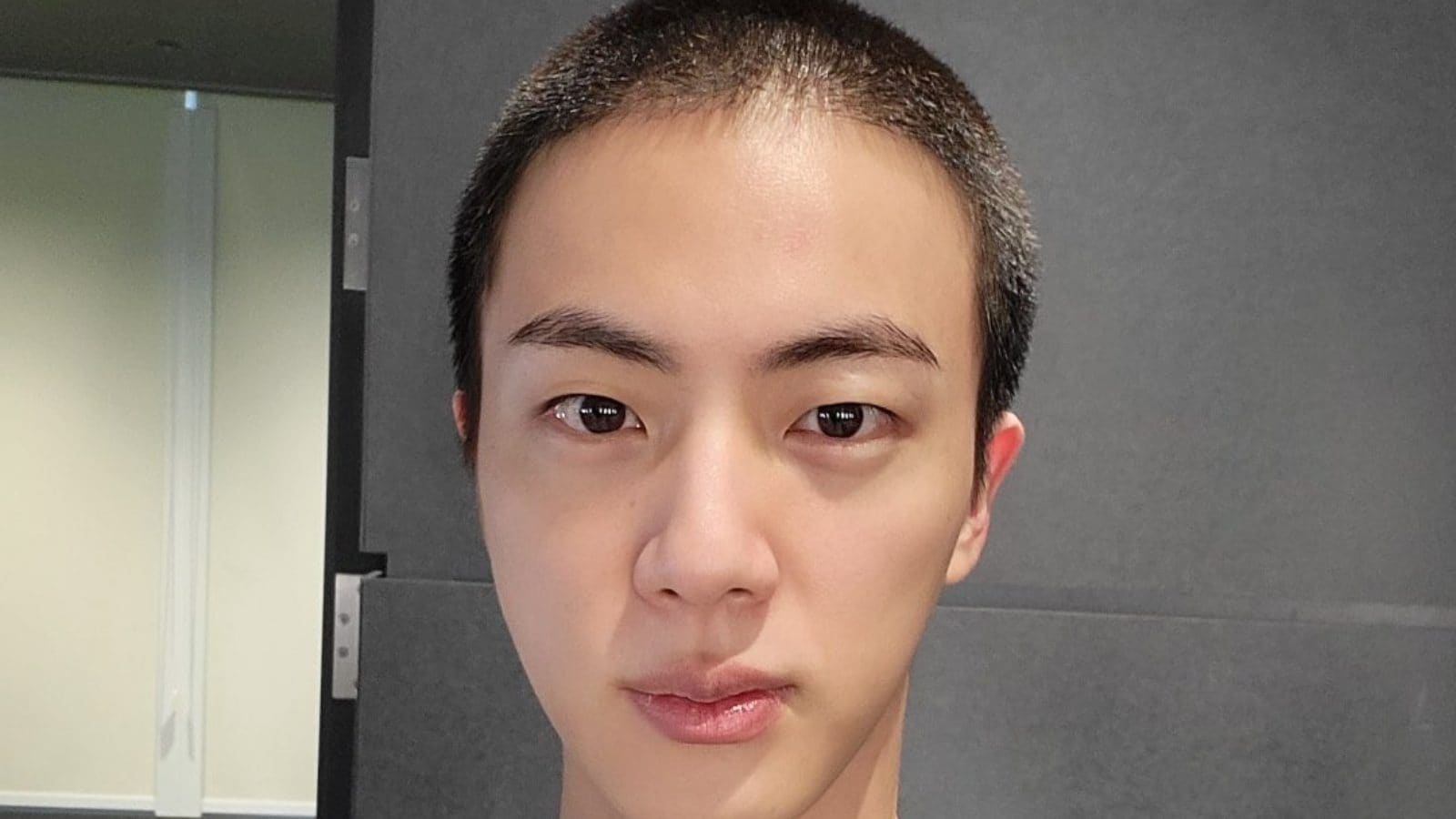BTS' Jin Shares Photo of New Buzz Cut Ahead of Military Service