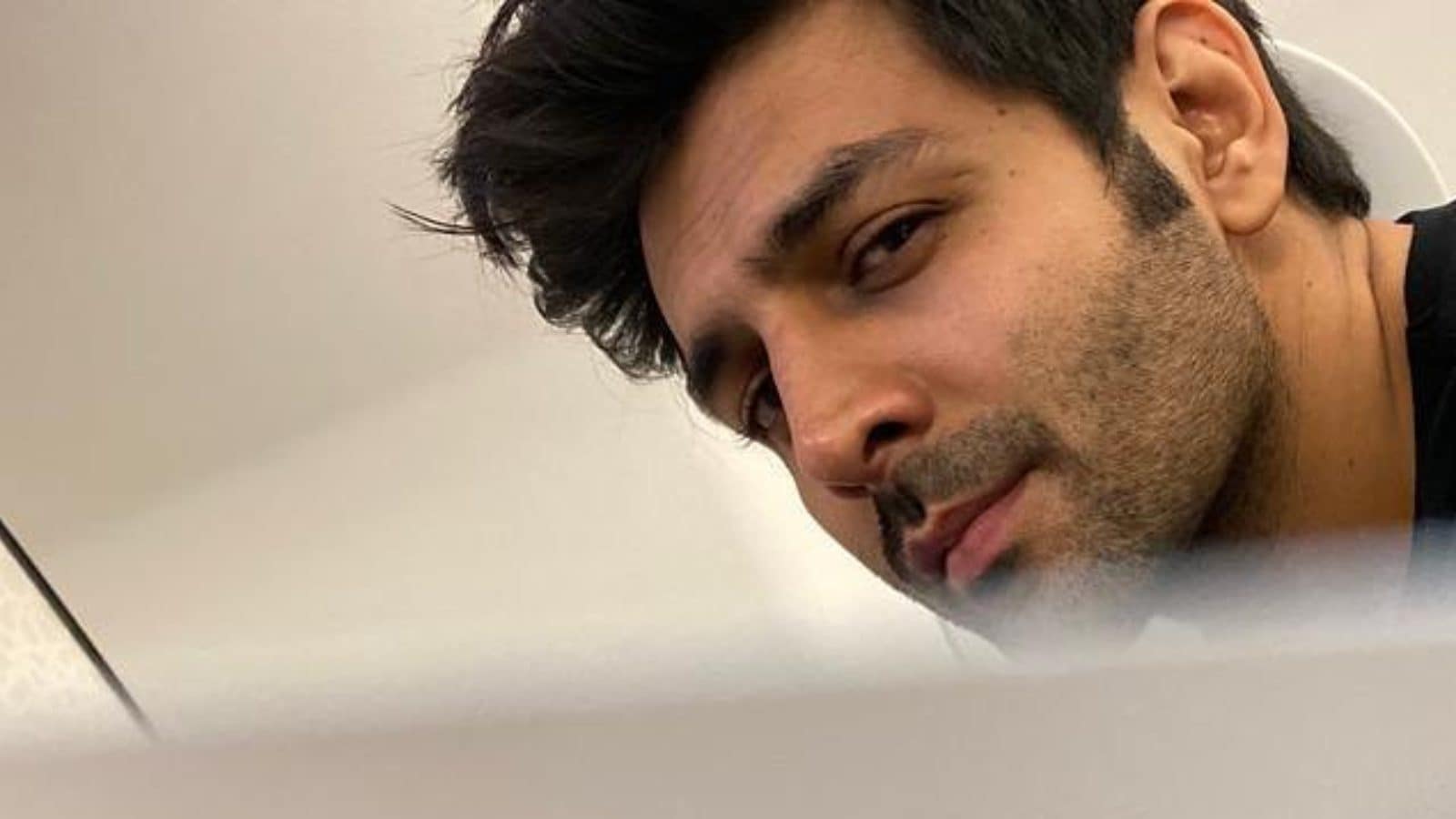 Kartik Aaryan Treats Fans To Stunning Selfie from Flight As He Leaves