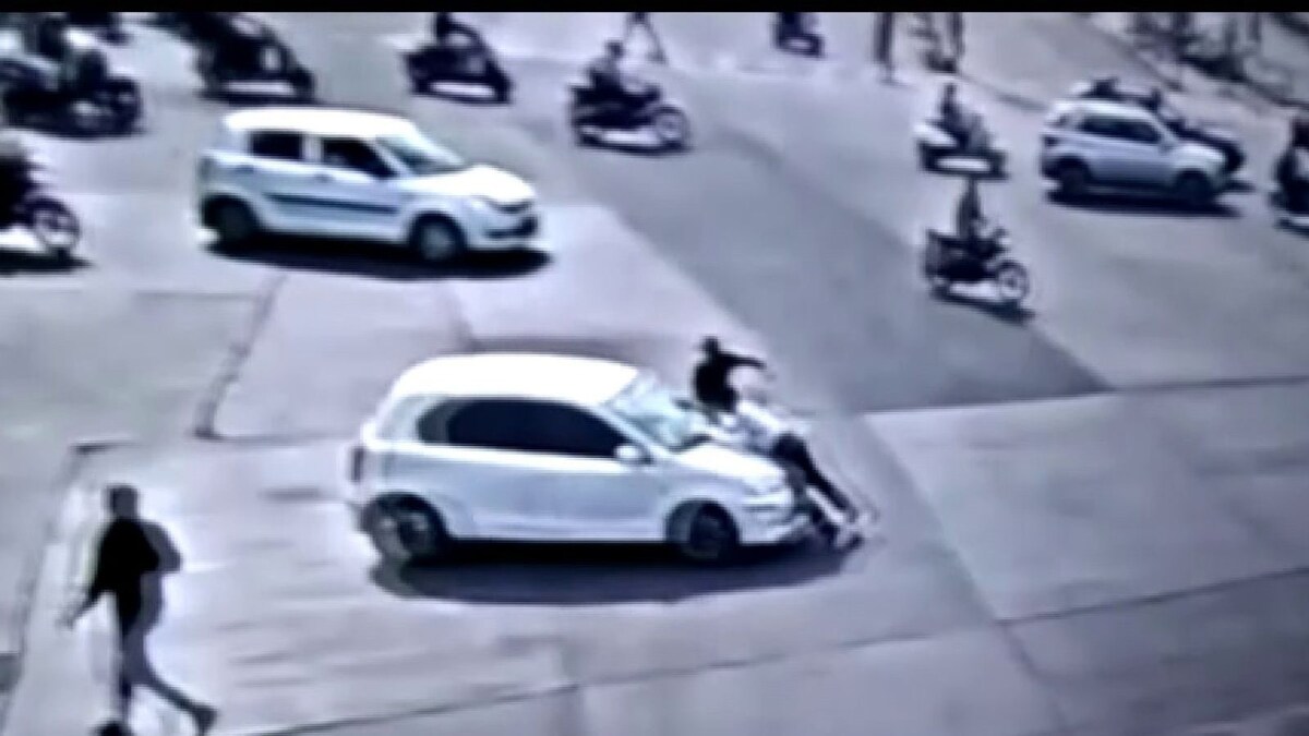 On Cam: Traffic Cop Jumps on Car Bonnet after Intercepting Driver, Gets Dragged for 4 Km in Indore