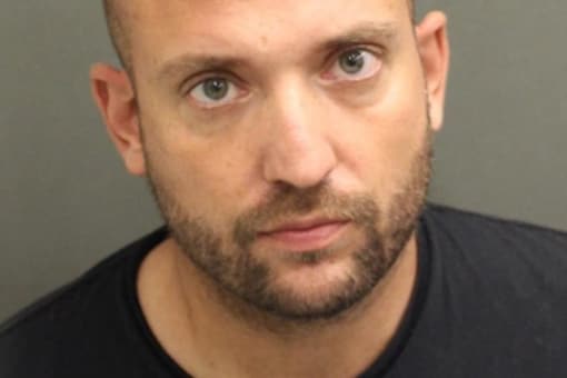 Nicolas Zapater-Lamadrid looted a bank and convenience store donning a police cap because he was bored (Image: Orange County Sheriff’s Office)