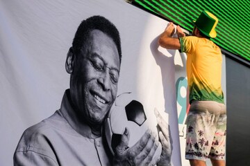Brazil fans at World Cup game show support for soccer great Pele