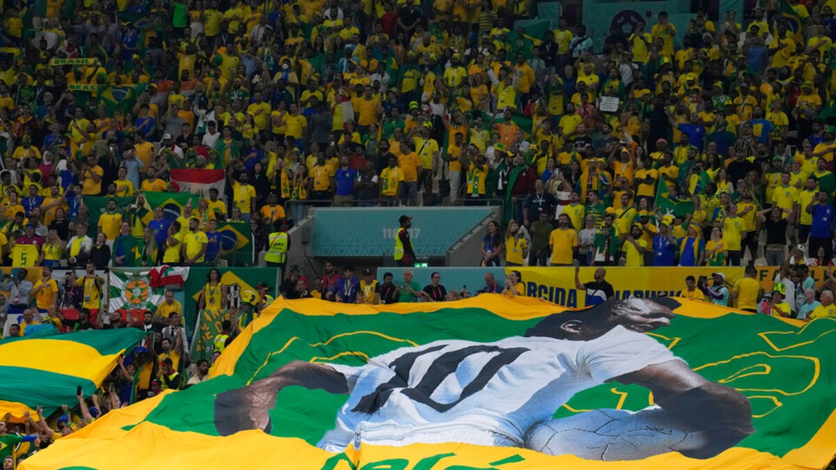 Brazil Fans at FIFA World Cup 2022 Show Support for Football Great Pele