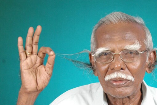 Man With World's Longest Ear Hair is a Retired School Headmaster from India