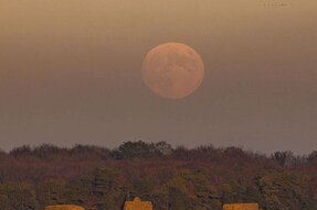 Stunning 'Cold Moon' Photos Flood Twitter As Awed Gazes Turn to Sky