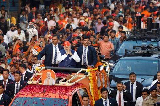 PM Modi at the road show in Ahmedabad on Thursday. (PTI)