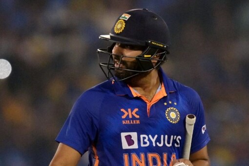Rohit Sharma walks back after his fifty against New Zealand in Raipur.