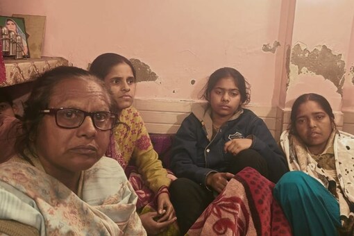 (From left) Anjali Singh's aunt along with Anjali's siblings and their mother, Rekha (extreme right), at their house in Delhi's Mangolpuri. The family has denied 'friend' Nidhi's version that Anjali had consumed alcohol, moments before the accident occurred. (Photo: Vatsala Shrangi/ News18)