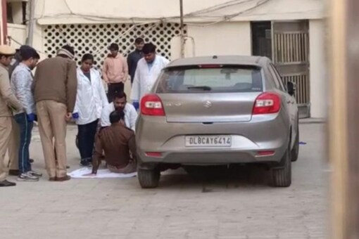 FSL team inspects the car that reportedly hit Anjali and dragged her for a few kilometres which left her dead in Delhi's Sultanpuri. (PTI Photo)