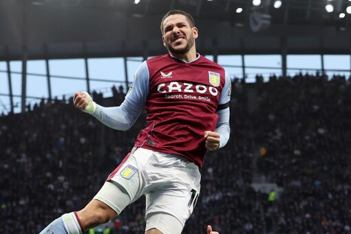 Aston Villa's Emiliano Buendia leaps in the air to celebrate after scoring his side's opening goal during the English Premier League soccer match between Tottenham Hotspur and Aston Villa at Tottenham Hotspur Stadium in London, Sunday, Jan. 1, 2023. (AP Photo/Ian Walton)