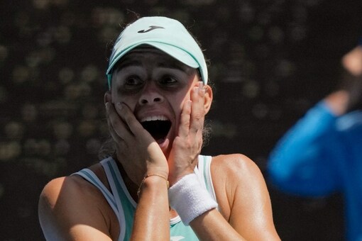 Magda Linette of Poland celebrates after defeating Karolina Pliskova of the Czech Republic in their quarterfinal match at the Australian Open tennis championship in Melbourne, Australia, Wednesday, Jan. 25, 2023. (AP Photo/Dita Alangkara)